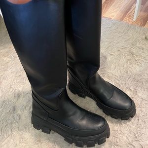 Tall black boots
